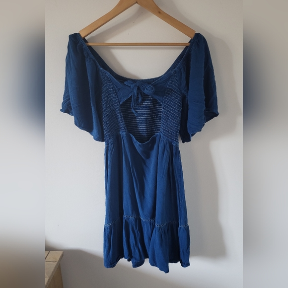⭐️ New Listing ⭐️ Natura Shirred Mini Dress with Bow in Blue - Picture 14 of 15